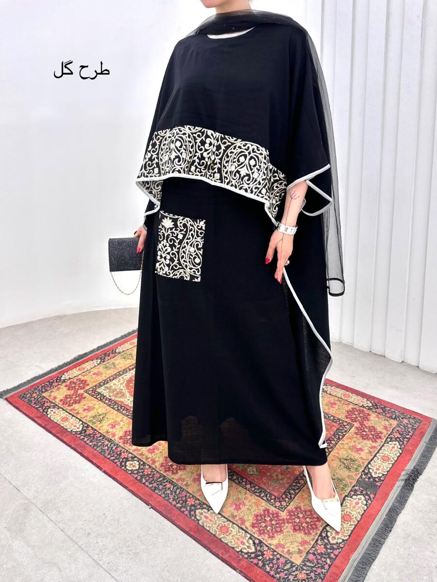 ست 2 تیکه پانچ پشت بلند و دامن مزونی خرج کار سوزن دوزی شده bt582